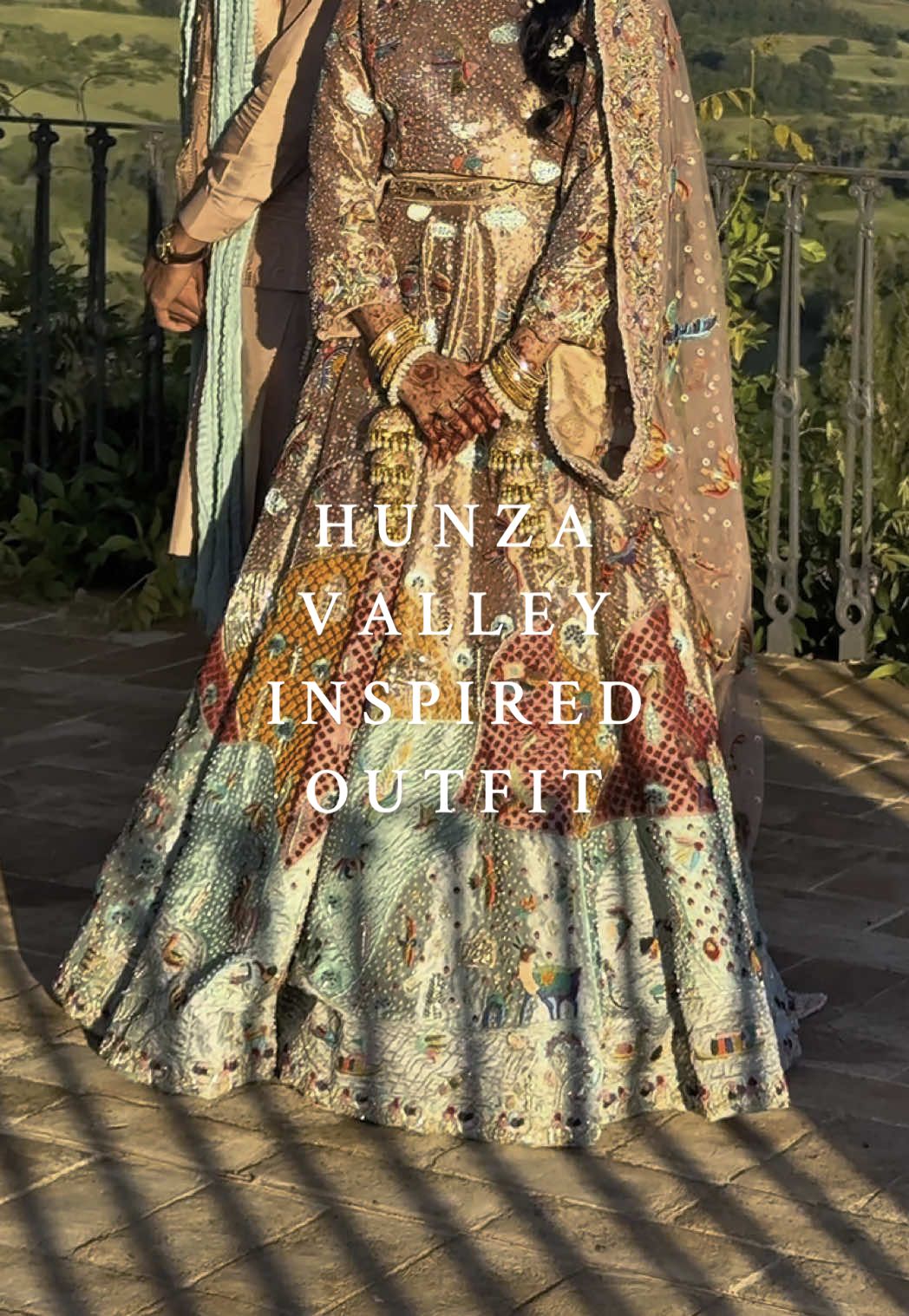 the landscape on my dress was inspired by Hunza Valley in Nothern Pakistan - villages, animals, trees, mountains, rivers It looks like an actual painting so I’m thinking of framing it as an art piece for my house 🎨 #mehndi #pakistani #pakistani_tik_tok #pakistaniwedding #mehndidress #mehndioutfit #pakistanstreetstyle #styledinpakistan 