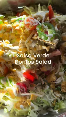 Salsa Verde Doritos Salad Every time we make a new Doritos salad we think it’s our best one yet and this one comes pretty close. The salsa verde flavored Doritos have  just enough heat to pair perfectly with the corn and creamy salsa verde dressing. This one’s a party in a bowl and you’re going to love it! 💃🌽🌶️ 1/2 c mayonnaise  1/2 c sour cream  1/2 c salsa verde 1 lime juiced  1 can corn 1 can mexi corn  1 can green chilies  Cherry tomatoes sliced 1 red pepper chopped  1 jalapeno sliced Shredded lettuce  11/2 cups pepper jack cheese shredded  1 bag salsa verde Doritos • #doritos #salad #corn #salsa #salaaverde #tomatoes #barbecue #bbq #Summer