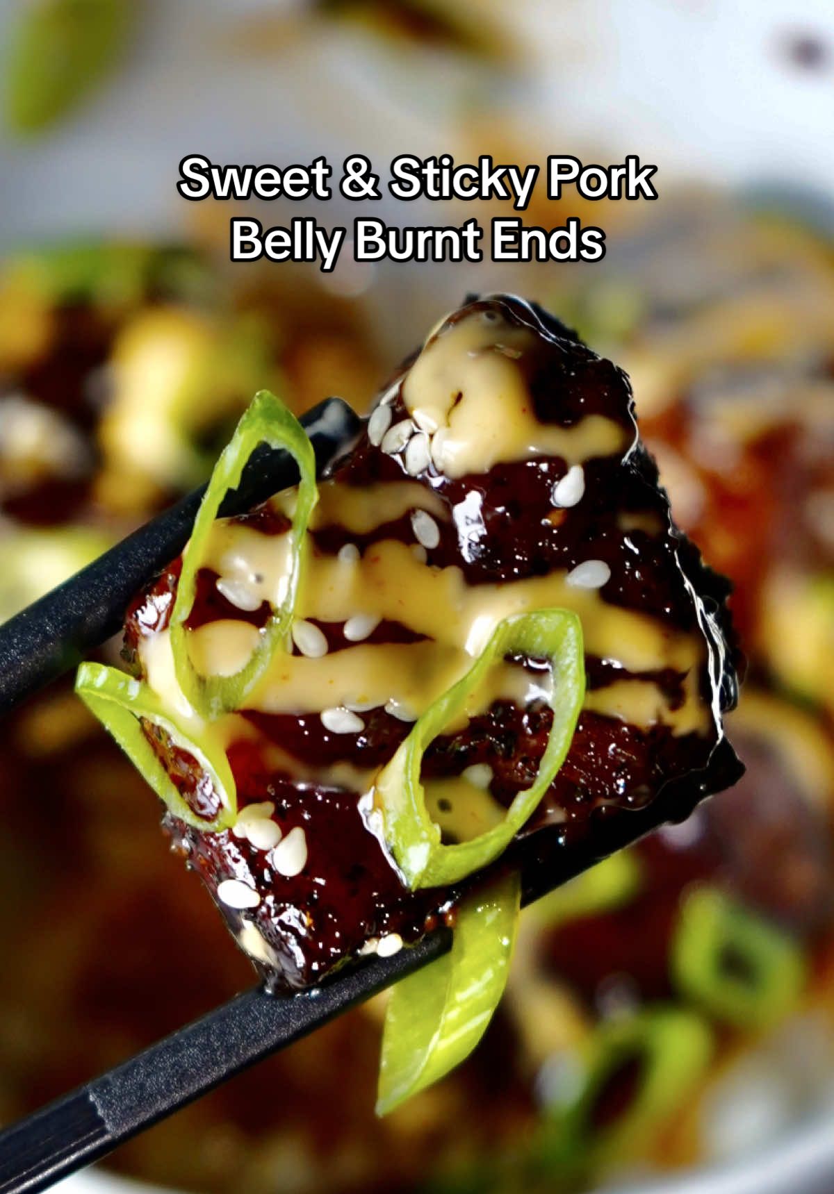 Sweet & Sticky Pork Belly Burnt Ends 🐷🔥 These were absolutely INSANE! Definitely not something I'd eat every day since they're super calorie dense... that said, they were worth every single bite! Seriously so damn good. They also make for a great cookout/party appetizer!  FULL RECIPE ⬇️ INGREDIENTS  - ~2.5 lb slab of pork belly  (Pro tip: make sure it's meaty)  - @Bachan’s japanese bbq sauce  - Salt Pepper Garlic Rub  Sweet & Sticky Sauce - 3/4 cup vegetable broth  - 1/2 cup japanese bbq sauce  - 1/4 cup soy sauce  - 2 tbsp rice vinegar  - 1 tbsp toasted sesame seed oil  - 2 tbsp sriracha  - 1/4 cup honey  - 1.5 tbsp minced ginger  - 2.5 tbsp minced garlic  - 1/2 cup brown sugar  - Corn starch slurry (1 tbsp cornstarch + 1 tbsp water) Toppings:  - @Terrapinridgefarms bang bang sauce  - Sesame seeds - Sliced green onions  Note(s): Measurements are estimated, adjust ingredients to your liking.  DIRECTIONS  1. Cut the slab of pork belly into ~1.25 in cubes. Coat them in japanese bbq sauce as a binder then season all sides with SPG rub.  2. Place them on the smoker at 275°F until they develope some bark and reach around ~180° internal (2-2.5 hours). 1. For the sauce, add all of the ingredients to a pan over medium-low heat. Mix till well combined and continue stirring over a low simmer till it thickens (~3-5 min). Once done, set aside.  2. Take them off of the smoker and place them in a pan. Top with the sweet & sticky sauce, give it a mix then cover tightly in foil.  3. Place them back on the smoker until they're probe tender (203-205° internal / 1-1.5 hours) then remove the foil and let them roll for another 20-30 minutes so the sauce can tack up a bit. 4. Take them off the smoker, let cool for a few minutes then plate them up & ENJOY! 🙌🏻 • • • • #explore #cooking #bhfyp #food #EasyRecipe #bbq #foodporn                