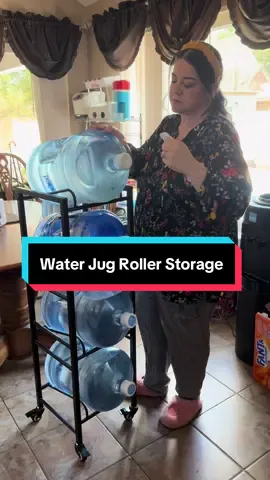 This water jug rolling stand has made my life so much easier! #storagehacks #waterjug #storage #laurensshoppicks 