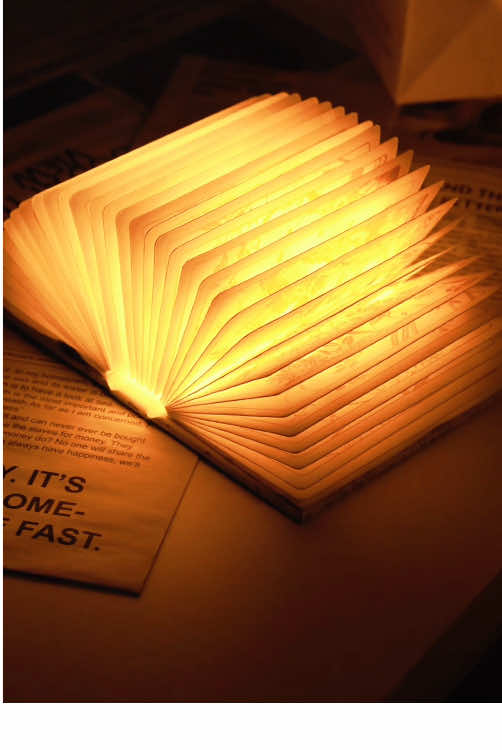 This multiple-color folding book lamp is just so cool. #book #booklamp #ledlights #booklover #gift 