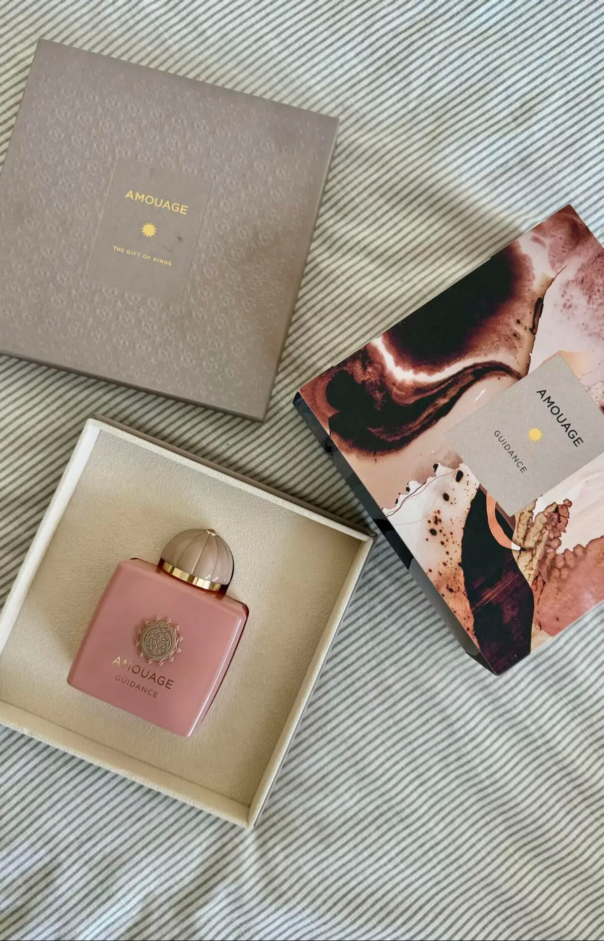 🌟Amouage Guidance🌟 ⸻ Amouage Guidance isn’t interested in trends or attention. It was released in 2023, composed by Quentin Bisch, and from its very first breath, it makes something clear: this is not a scent designed to please the crowd. It was made for the one who already knows who she is. It opens in quiet warmth — a toasted hazelnut note, rich and velvety, rises like the scent of earth after soft rain. Then comes pear, not juicy or bright, but slow and syrupy, like a fruit reduced in honey. It never leans playful. Instead, it’s thoughtful, grounded — like someone who speaks softly, but never has to repeat herself. Frankincense weaves through this warmth like a trail of sacred smoke — airy, resinous, calming. It lifts the sweetness upward and turns the opening into something far more meditative. As the scent begins to bloom, it becomes clear you’re wearing something complex. Osmanthus brings its signature tension — that strange blend of apricot and leather — while jasmine sambac rises thick and heady, like the air before a summer storm. Rose follows, deep and full-bodied, less flower and more oil — luxurious, ancient, regal. And throughout this heart, a thread of saffron glows like fire beneath silk: warm, golden, and quietly spicy. It doesn’t scream luxury. It simply smells like it. Then the base reveals itself — slow, steady, unhurried. Akigalawood adds a hum of spicy wood, peppery and dry, just enough to keep the florals from floating away. Vanilla begins to soften the edges, but it’s not sugary or loud — it’s warm, like breath on skin. Sandalwood rolls in smooth and creamy, while cistus adds a resinous depth that folds everything in amber light. And finally, ambergris — that mysterious, salty skin musk — grounds the entire structure with radiance and sensuality. Projection is steady and full-bodied, especially in the first few hours. It doesn’t scream, but it absolutely makes its presence known — like a silk robe brushing the room as it moves. Sillage is strong in that elegant, quiet way Amouage does best: not overpowering, but impossible to ignore. The trail it leaves is golden, spicy, and haunting. As for longevity, it wears for 10 to 12 hours easily on skin, and much longer on fabric — sometimes well into the next day. It clings, but never overstays. It simply waits. Guidance isn’t for every day. It’s not casual, and it’s not “pretty.” It’s composed. Introspective. Worn best by someone who doesn’t need their perfume to say too much — because they’ve already said enough with their presence. This isn’t a fragrance you wear to be noticed. This is the one you wear when you’ve already been seen. #AmouageGuidance #LuxuryPerfume #FragranceReview #ScentStory #PerfumeLovers #NichePerfume #FragranceCommunity #PerfumeAddict #FragranceJourney #ElegantScents #LongLastingPerfume #PerfumeCollection #FragranceObsessed #ScentOfTheDay #PerfumeReview #AmouageLovers #FragranceArt #PerfumeCulture #UniqueFragrance #NicheFragrance @AMOUAGE 
