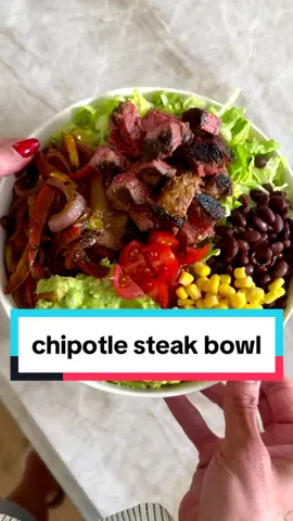 CHIPOTLE STEAK FAJITA BOWLS, omgahhhh delicious! This meal packs a huge flavor punch and that is because of the smoky chipotle marinate on the steak and fajitas veggies. You can serve the steak and veggies any way you'd like and you will likely have lots of leftovers to enjoy during the week, but I love it like this-with rice, lettuce, corn, beans, and guac. I promise simple meal will have you craving it weekly and I'm excited for you to try it! SAVE this post, SHARE with friends, and be sure to FOLLOW for more! Chipotle Steak 1 1/2 lbs sirloin steak (or flank steak) 1/4 cup olive or avocado oil 1 lime, juiced 1/2 cup chipotles in adobo sauce (I used the full 7 oz can) 4 cloves garlic, mashed 2 tsp cumin 2 tsp oregano 1 tsp ground black pepper 3 bell peppers of choice, sliced into thin strips 1 red onion, sliced thin 1 cup cooked jasmine rice 3/4 cup canned corn (optional) 1 cup canned black beans 1 cup baby tomatoes, halved 1 head romaine lettuce, chopped super thin Guacamole (store bought or homemade) First, marinate the steak. In a bowl or tray, add the steak. Drizzle the oil and lime on top, then add the chipotles, garlic and seasonings. Rub both sides of the steak well and let marinate for 30 minutes (or overnight). While the steak is marinating, slice the peppers, onions, tomatoes, and prep the rice and guacamole (if making). Next, heat a cast iron skillet over medium-high heat. Add avocado oil to the skillet and one the pan is hot (too cold and the steak will be gray and stick), add the steak. Leave undisturbed for 4-5 minutes depending on the thickness of your steak. Flip to the other side and leave undisturbed for another 4-5. This is for rare/ medium rare (how I personally like it. Remove steak from skillet and transfer to a cutting board to sit for 10 minutes, before slicing. In the meantime, pour some of the leftover marinade into the skillet and add the bell peppers and onion. Saute for 3-5 minutes until softened. Remove from heat and assemble your bowls. Add rice, lettuce, the fajita veggies, corn, black beans and guacamole. ENJOY!