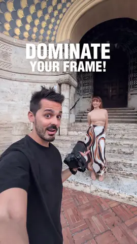 Dominate your frame and make your subject look larger than life. Getting low down and shooting up gives a worms-eye perspective that makes your subject dominate in the frame. Not to mention the added elements of composition bring your attention in towards the subject, in this case Stella who modelled for this shoot. 💃🏻 📍Rome 📷 Canon R5ii w/ 15-35mm #portraitphotography #agphotog #phototips #learnphotography #cameragear #photography #cameras 