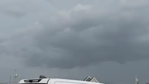 We saw this storm rolling through the OBX today, and this wasn’t even the worst of it. One bolt. One loud crack of thunder. This short clip doesn’t do the chaos justice—but Mother Nature definitely reminded us who’s boss. ⚡🌊⛈️ #OBXStorm #OuterBanksWeather #StormWatching #NatureIsWild #ThunderAndLightning 