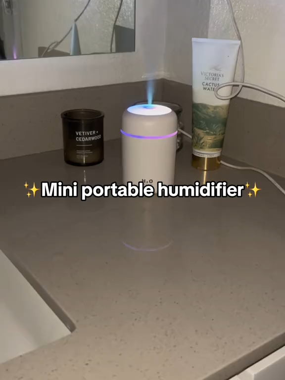 Revitalize your environment wherever you are with this compact, ultra-convenient Mini Portable Air Humidifier. Sleekly designed and travel-ready, it transforms dry air into a soothing mist to enhance skin, respiratory comfort, and overall wellbeing #humidifier#humidifiers#humidifiermini#airhumidifier#diffuser#aromatherapy#essentialoils#airpurifier#healthylifestyle#homedecor#dailyessentials#healthyliving#dryskincare#wellness