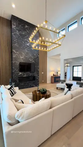 ✨You're NOT ready for this jaw-dropping luxury tour… but let’s dive in anyway 😍🏡 Tucked inside the award-winning master-planned community of Sienna in Missouri City, TX, this stunning Jamestown Estates custom build is what dream-home fantasies are made of 😮‍💨 From the moment you step into the grand entry, you're greeted with soaring double-height ceilings, jaw-dropping modern light fixtures, and the kind of open-concept layout that makes every inch of its 5,174 sq ft feel even more expansive 🛋️✨ This one-story masterpiece sits on a generous 100’ lot and is dressed head to toe in sleek contemporary design. With 5 bedrooms, 6.1 baths, a split 4-car garage, and designer staging that brings it all to life — this home is a SHOWSTOPPER 🔥 🍽️ The chef’s kitchen? Pure perfection — featuring high-end appliances, a hidden catering kitchen, walk-in pantry, and elegant floating cabinets.  🛏️ The primary suite feels like a 5-star resort with cathedral ceilings, wood beams, and a spa-inspired bath with a 67
