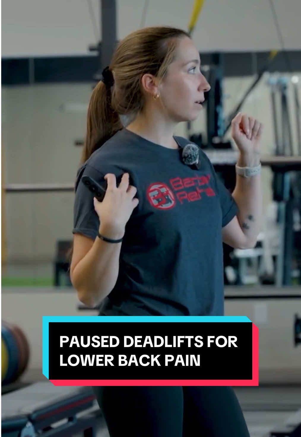 Back pain can be a little gremlin.  It creeps in, messes with your head, and suddenly everything feels like a threat — even that barbell you used to yank off the floor like a boss. Here’s the thing, Back pain isn’t just a biomechanical issue.  It’s a cocktail of fear of movement, increased stress, lack of sleep, iffy nutrition, beliefs about pain, and maybe even that one time you sneezed weird in 2016. But, if we do put on our biomechanics hat, we can get clever. Enter, paused deadlifts.  Specifically, a pause just below the knees. 👉 This position keeps your tension in your trunk without max-loading the lower back.  👉 It forces you to own your positioning. No cheating, no momentum, no ego.  👉 It’s a sweet little isometric that says, ‘hey brain, this isn’t scary — we’re strong here.’ 👉 Using a lighter load with a pause allows you to still get a solid training stimulus. Why does that matter? Because when the low back is cranky and sensitive, heavy & fast pulling might be a bit much. But pausing mid-rep lets you still train the pattern, develop a positive relationship with hinging, and tell your nervous system to chill out. Plus, lighter load, solid stimulus. We love an efficiency moment. To be clear, loading your low back is not bad. It’s actually good for you. It’s necessary.  But it’s gotta be dosed right — especially if pain is present. So next time you’re coaching or training through a flare-up, don’t scrap the deadlift entirely. Just make it work for you. Pause it. Feel it. Own it. What are some loading strategies you like to use for lower back pain? Want to learn how to coach and modify lifts for pain? Sign up for a @barbellrehab course! Want to take control of your body and finally lift without pain? Apply to work with @dr.susie.squats 🤓 #backpain #rehabcoach #deadliftform #strengthtraining #physicaltherapytips #barbelltraining #backpainexercises