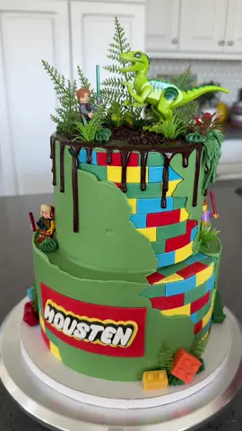 Lego 🤝 Jurassic 🤝 Lightsaber #cake #cakedecorating #lego #dinosaur