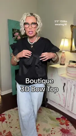 The cutest girly bow top with ruffly sleeves #boutiqueclothing #boutiqueshopping #boutiquestyle #womenstops #womensfashion #cuteoutfits #affordablefashion #dealsforyoudays #tiktokshopcreatorpicks @Sage Vell 