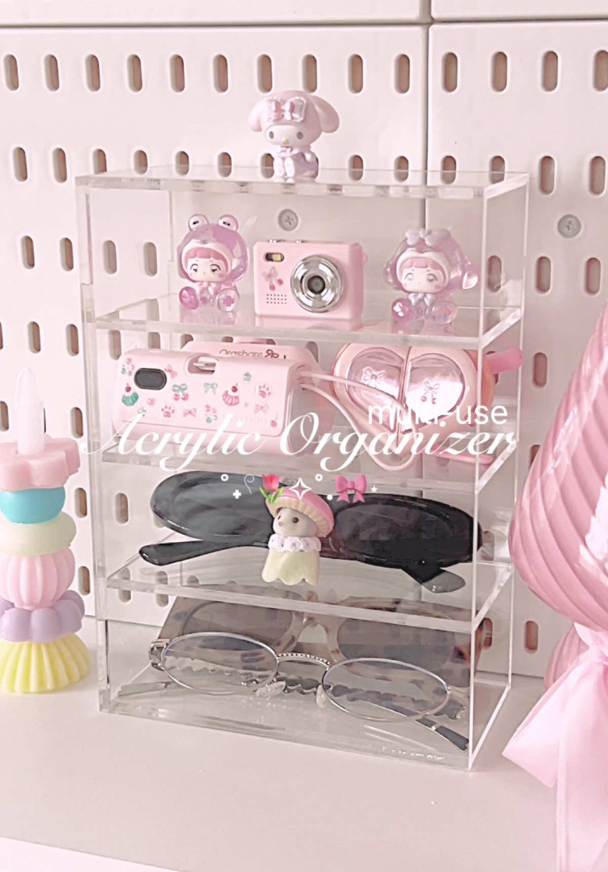 if ur obsessed w/ organizing cute stuff… u need this 💘✨ love that it can fit my powerbanks, mini figures, earbuds, sunnies, mini camera && sylvanian!! 🌷 #organizer #acrylicorganizer #sylvanianfamilies #tiktokfinds #organizewithme #musthaves #cutefinds #fyp #viral #trending 
