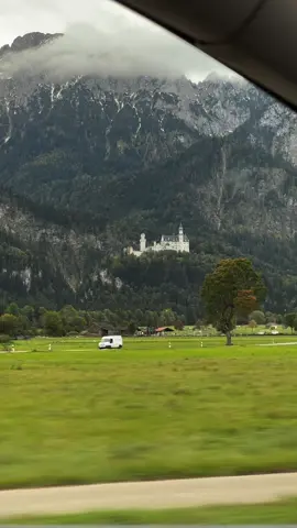 ✨This castle has always reminded me of my favorite childhood cartoon — Beauty and the Beast. There’s something so magical about its silhouette, like it stepped right out of a fairytale… But no, it’s not Disney — it’s the real-life Neuschwanstein Castle, nestled in the Bavarian mountains and said to be the inspiration for the Disney castle itself. Standing here, you almost expect the music to start and Belle to appear in her golden dress… 🌹🏰 #neuschwanstein #germanycastle #beautyandthebeast #disneyinspired #travel 