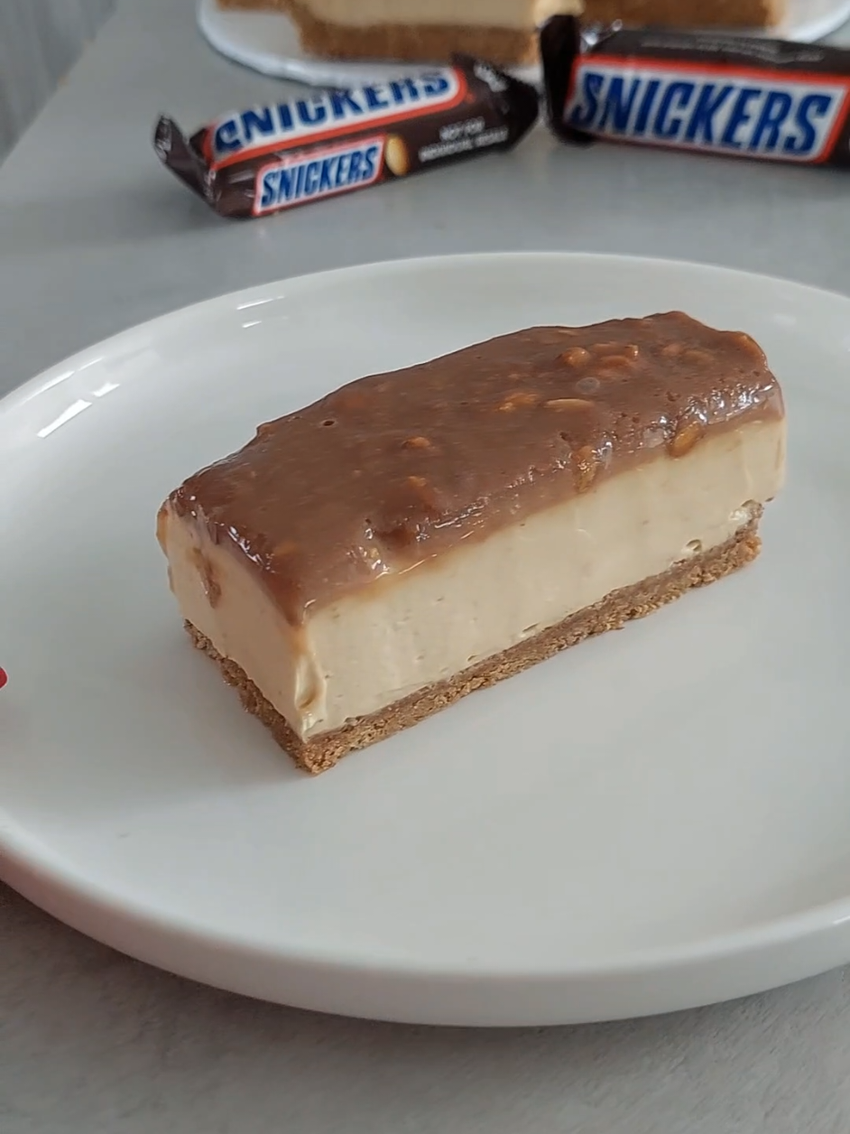 Snickers Cheesecake Bars – Super Simple and Absolutely Delicious! 😋 Ingredients are listed in the video, and all recipes are available on my website: barbhomekitchen.com#snickers #cheescake #nobakedessert #simplerecipe #foodies 