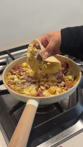 recipe for Huevos con papas & salchichas 👇🏼 I start by boiling the potatoes for 10 minutes cause I’m impatient and don’t want to wait forever for the potatoes to get soft Once done boiling add to a pan with oil and cook until a bit crispy but still soft. About 10-15 mins. Season with paprika, black pepper, onion powder and garlic powder Then cut up your onion and wieners. You can also add in bell pepper to elevate the flavor. Once potatoes are done, add in veggies and wieners. Cook until the salchichas have a little char. Then add in 4 eggs.cook until done, add cheese on top, let it melt and enjoy ✨  #food #Foodie #breakfast #breakfastideas #breakfastrecipes 