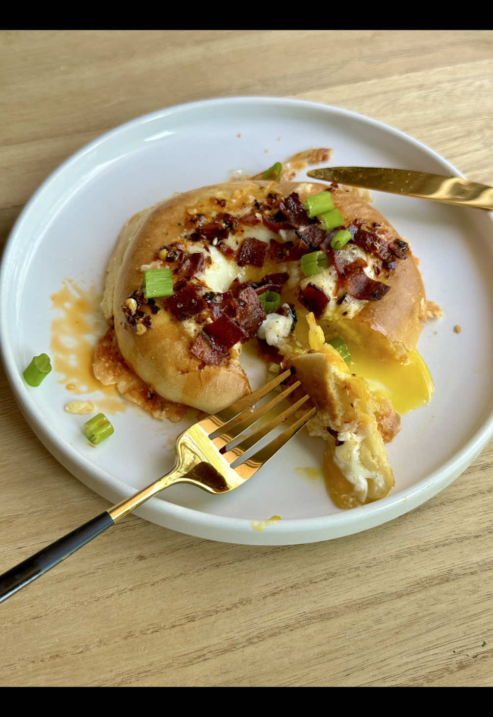 Have you tried the viral TikTok bagels?  1 bagel 1/4 cup shredded cheese (I used pepper jack) 2 eggs Salt Pepper Crumbled Bacon (optional ) Place half of the cheese on the bottom of a nonstick baking sheet in patches about the same size of your bagel . Place half of the bagel on top of shredded cheese face down. Crack an egg into each bagel hole. Season with salt and pepper and top with crumbled cooked bacon, if desired. Bake at 350° for 15 minutes then serve. . . . #bagels #viralrecipe #breakfastideas #eggrecipe #breakfastrecipes 