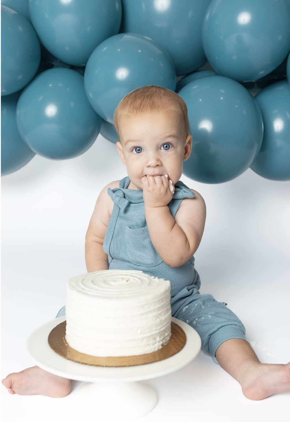 DIY Cake Smash photos🎂 From my dinning room, I created this cake smash photos and I’ll forever cherish them. The last year has been the greatest gift with my two boys, and I’m so thankful I can capture the sweet memories of his first birthday  Sharing the answers to frequently asked questions. Drop your questions in the comments: Q: how many balloons do you use? A: 3 of the 17 inch and 24 of the 11 inch balloons Q: what other ideas do you have for backdrops? A: I actually started out with a sheet as a backdrop for some cake smash photos!  Q: how do you order your cakes? A: it’s a white cake with white buttercream frosting with a spatula drag. I always buy my cakes from @H-E-B  Q: what do I do if I don’t have a camera or lighting? A: use a phone! Photos will still look great! And look for lighting around your house. I always find an area with a bunch of windows for the best lighting.  Q: do you keep the topper on for photos? A: no, it quickly gets removed because usually my kids start trying to pull it out. Q: where do I get your overalls? A: they are from @Kyte Baby LLC and I have them linked on my ltk and in my bio.  DIY photos, cake smash photos, baby birthday photos, first birthday photos, diy first birthday, 12 month photos  #babycakesmash #firstbirthday #diyfirstbirthday #firstbirthdayphotoshoot #cakesmash 