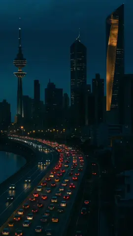 City lights, Kuwait nights 🌆 #NightVibes #TrafficTrails #ArchitectureLovers #CityPhotography #SkyscraperLove #UrbanMood #GoldenHourGlow   
