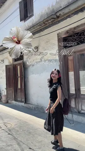 slow walks, soft air, and my own quiet company, nothing quite like this little alley🌺☀️🍃🤍 would love to return someday⛅️! #soloplacetogo #solo #foryou #PlacesToVisit #DigitalDiary #placetogosolo  #slowtravel #spotbungadisolo #kampungbatiksolo #kampungbatikkauman #kaumansolo 