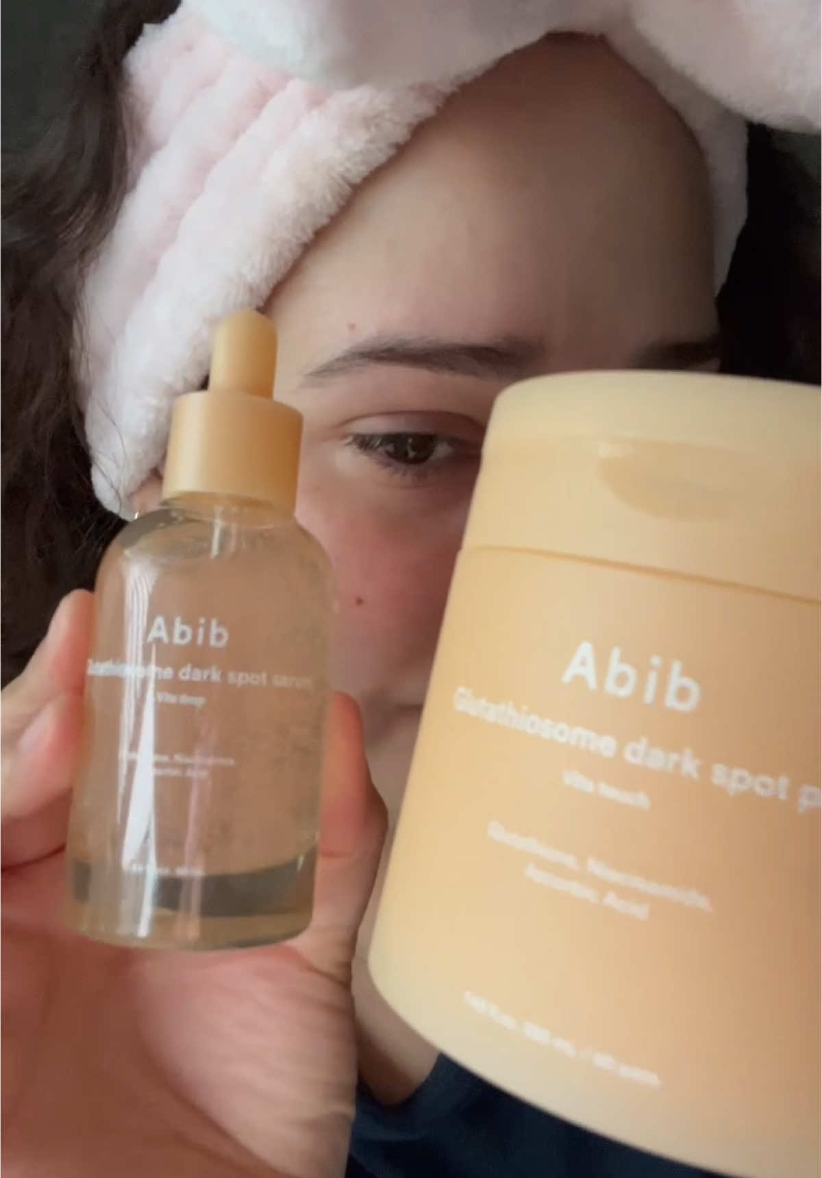 Abib: Abib Glutathiosome Vita Duo (Pad + Serum) -Glutathiosome dark spot pad Vita touch -Glutathiosome dark spot serum Vita drop I recently tried the Abib Glutathiosome Vita Duo, which includes the Vita Touch pads and Vita Drop serum, and I’ve been pleasantly surprised by how gentle yet effective both products are.  The pads are soft and soaked in a lightweight essence that feels refreshing and hydrating without being sticky. They’re great for daily use, even on sensitive skin, and contain ingredients like Glutathione, Niacinamide, and Vitamin C to help brighten dark spots, while LHA and Madecassoside gently exfoliate and calm the skin. After just a few days, I noticed a subtle glow and a more even tone, especially around old acne marks.  The serum has a watery, fast-absorbing texture that layers beautifully under other skincare and makeup. It also contains Glutathione, Vitamin C, and Beta-Glucan, which helped hydrate my skin deeply and gave it a smoother, more radiant appearance without irritation.  After about a week of consistent use, my skin looked noticeably brighter and clearer, with dark spots starting to fade and an overall healthier, dewy finish.  This duo won’t give you overnight miracles, but if you're looking for a gentle brightening routine that actually works and feels good on the skin, it’s definitely worth trying. Thanks to: @Abib Cosmetics  #hwahae #Abib #darkspots #glutathione #vitaminc #niacinamide