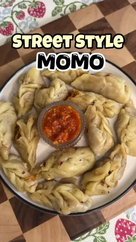 Spicy street style momo recipe. Ingredients For Dough: 	•	1 cup all-purpose flour (maida) 	•	¼ tsp salt 	•	Water (as needed) 	•	1 tsp oil (optional) For Filling: 	•	1 cup finely shredded cabbage 	•	½ cup grated carrot 	•	¼ cup finely chopped onion 	•	2 cloves garlic, minced 	•	½ inch ginger, grated 	•	1 green chili, chopped (optional) 	•	1 tsp soy sauce 	•	Salt & pepper to taste 	•	1 tsp oil #momo #momorecipe #spicymomos #streetstylemomos #punjabimomos #momoslover #momos 
