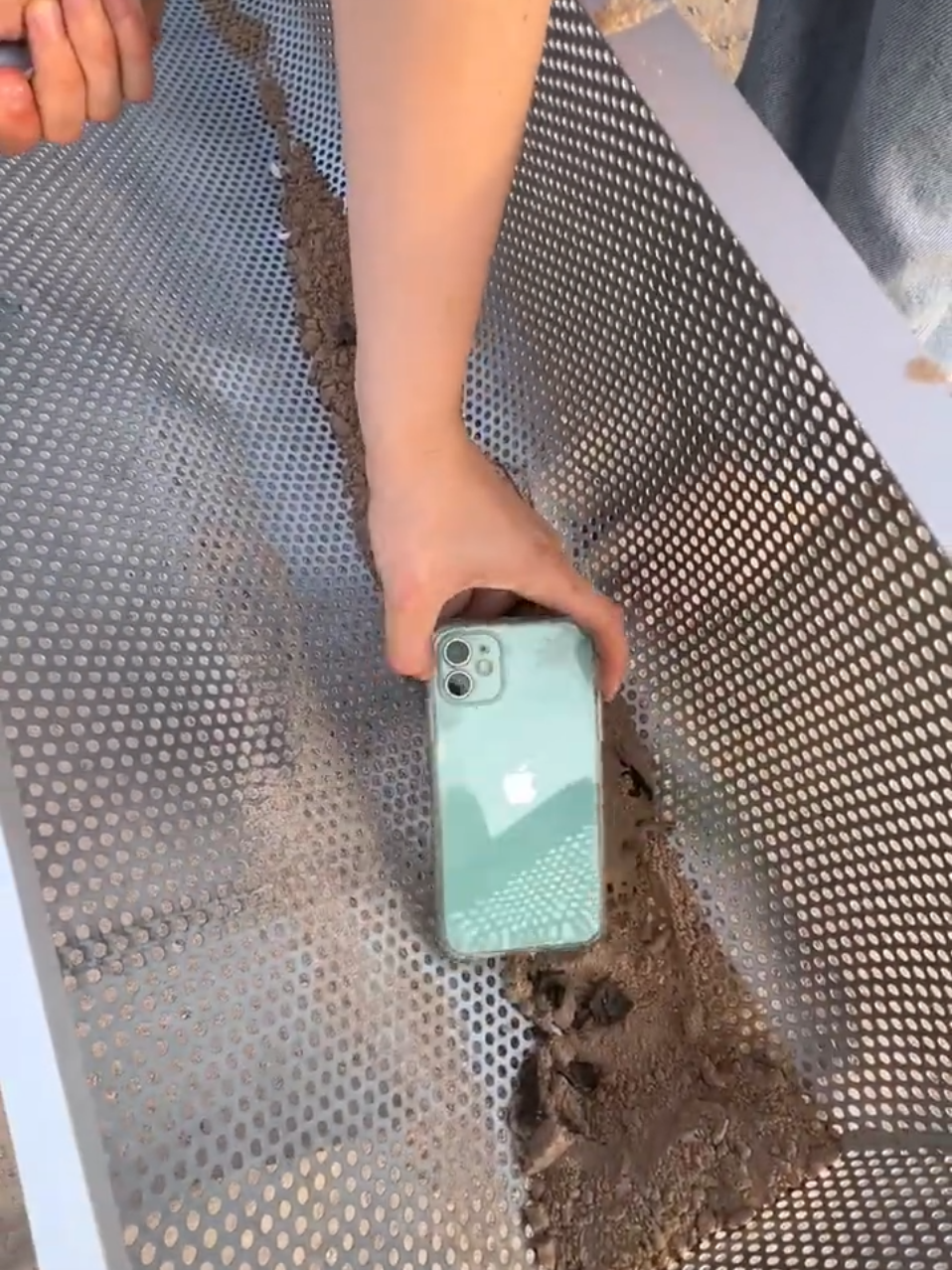 Beach Treasure found i phone😱#gold #beach #treasure #discovery #viral 