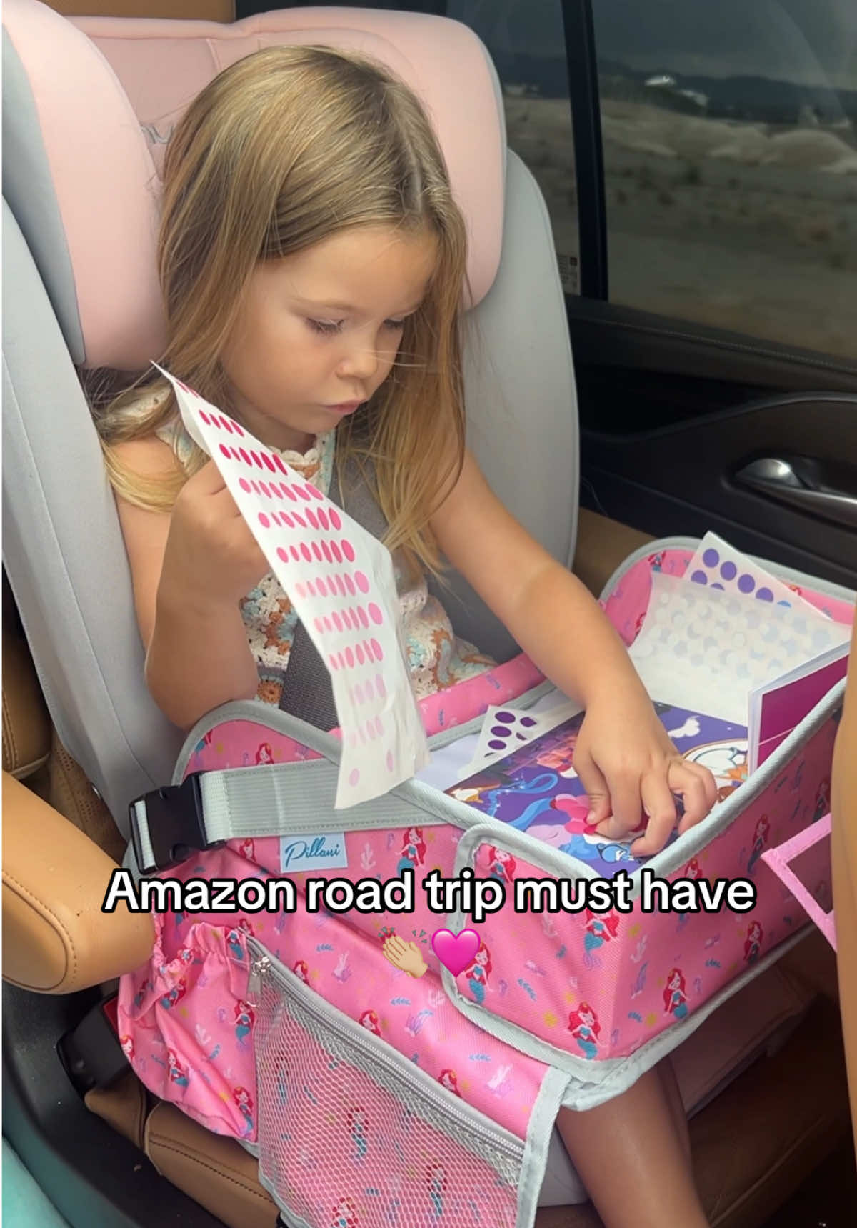 If you’re taking a road trip anytime soon, you need this! Thank me later 💅🏼 Linked in my LTK in my bio  #roadtrip #travel #travelmusthaves #momhack #girlmom #travelingwithkids #traveltips #activitiesforkids 