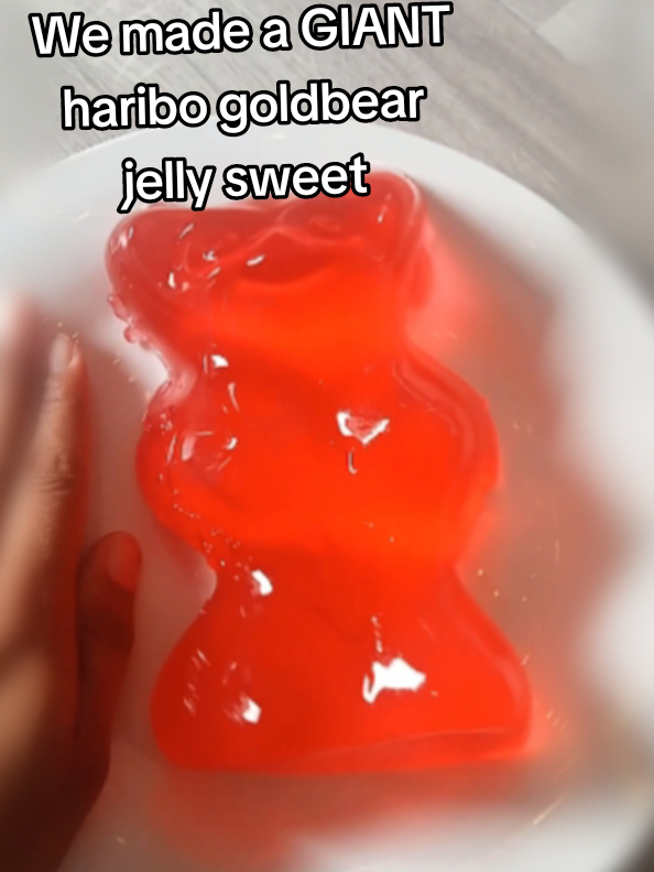 My son wanted to make a giant haribo sweetie , it's bigger than my hand! #haribo #hartleysjelly #jellyplay #FoodTok #cooking #baking #sweettooth #foryou #tiktokviral #fyp #mumsoftiktok #mum #mumlife #son #creativeideas #fun #huge #giant #big #oversized #teddy #mumandson #foru 