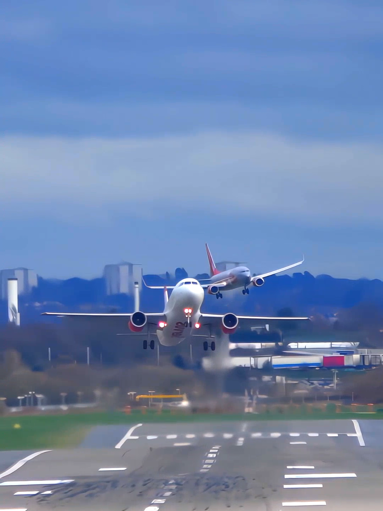 Double Trouble at Birmingham Airport One Runway, Two Flights #Birmingham #Aviation #Runway #TravelGoals #PlaneSpotting