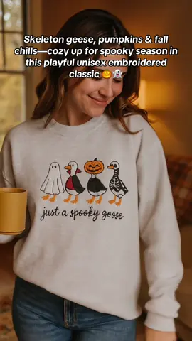 Spooky Goose Embroidered Halloween Sweatshirt Skeleton geese, pumpkins & fall chills—cozy up for spooky season in this playful unisex embroidered classic.