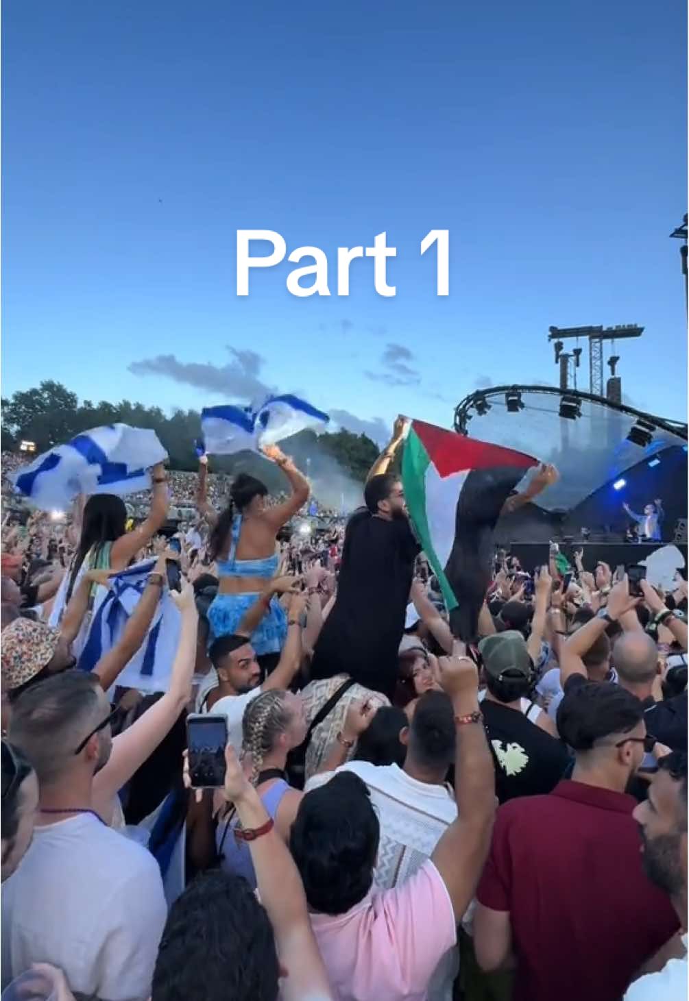 What started as a peaceful moment turned into something much bigger. 🇮🇱 One flag went up.  🇵🇸 Another followed, calm, proud, and smiling. Then came the reaction.  Crowds gathered. Flags surrounded him.  Chants filled the air: “El’ey Yisrael.” But he didn’t flinch.  He danced. He smiled. He stood for peace ✌️ And then… I saw something I couldn’t ignore.  I had to move. I had to step forward. 🎥 This is just the beginning.  ❤️ Like & share if this moved you.  #tml #palestine #israel  #Tomorrowland2025 #PeaceUnderPressure #LetThemBothBeSeen #ViralVideo #IsraelPalestine #EDMForPeace #UnityThroughMusic #OneStageOneWorld #EDMCommunity #HumanityFirst #ThisIsReal #FestivalMoment #FlagsOfPeace