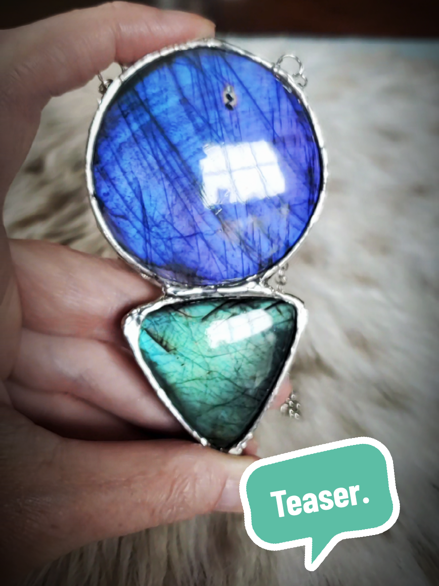 These colors! 😱 OMG!!! Currently a very simple design in silver soft solder. It may stay this way...it may receive further embellishments.🤷🏻‍♀️ Haven't decided yet.  #labradoritenecklace #labradoritejewelry #handmadejewelry #silversolder #purplelabradorite #teallabradorite #creative_goddess_goods #artistsoftiktok #alchemist 