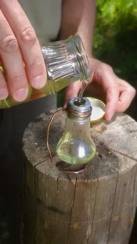 This is a brilliant IDEA! Try it out! #survival #lifehacks #bushcraft #camping You'll learn a great trick for making an oil lamp out of an old incandescent light bulb! This will come in handy for camping and survival!