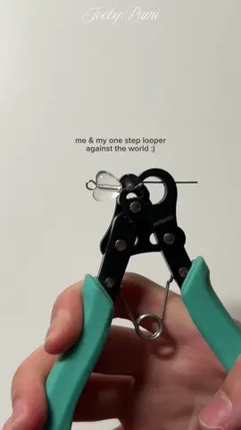 my most frequently asked question is what the aqua colored tool I use is!! I love my one-step looper, it saves me from a lot of hand pain from making lots of jewelry :) Let me know if you guys want a tutorial and/or my full opinion!! Have a #joobilicious day my lovely amazing friends 💌 Reminder that sign ups for my Forest Critter JoobyJar close on August 15th!!🌱 #makingof #handmadejewelry #handmade #SmallBusiness #diyjewelry #jewelrymaking #craft #DIY #craftidea #beads #onesteplooper #explore 🫶🏻