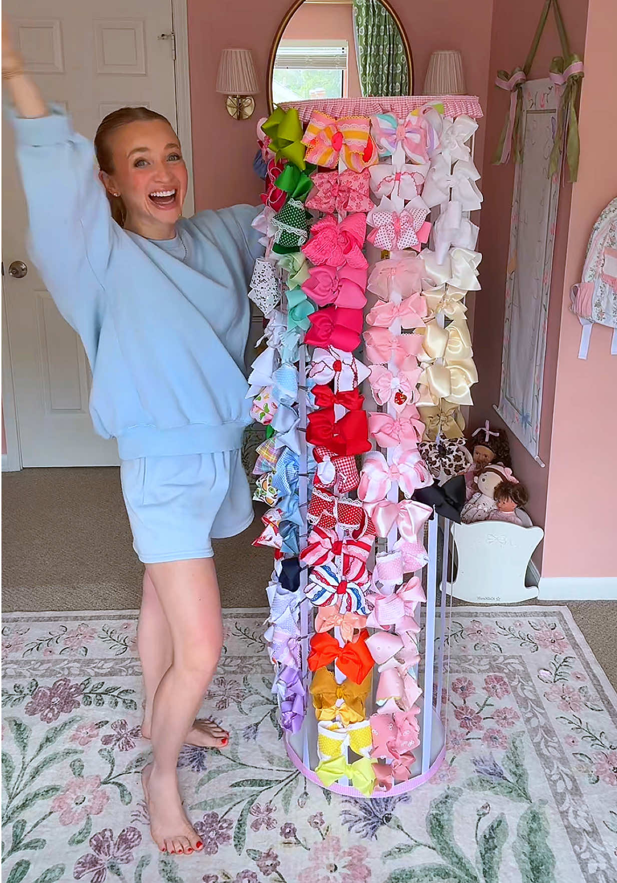 And just like that… we went from too many bows to better start shopping to fill this stand! 🤭🎀🩷 I’ve had the supplies sitting around for months—if only I’d known how easy it would be! Used 16” wood circles + 1” ribbon, spaced 1.125” apart. Super simple and super cute! #DIY #bowholder #boworganizer #babygirlroom #girlmomlife #diynurserydecor #kidscrafts #babygirlstyle #crafttok #girlmomtok #toddlergirlstyle #nurseryhack