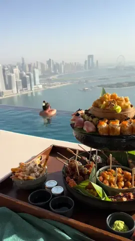 Sushi at the Aura sky pool in Dubai? Amazing 🔥 #dubai #auraskypool #sushi #fyp
