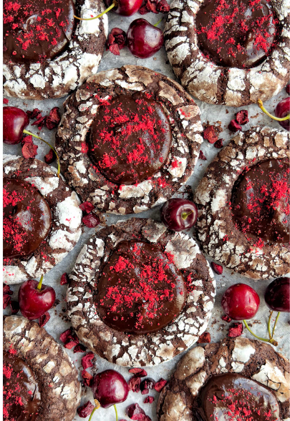 Cherry season is still in full swing and these Chocolate Cherry Crinkle Cookies need to be top of your list to make this summer🍒 They’re so easy and so delicious, honestly one of my best🌞 The full recipe is below ⬇️ #chocolate #cherry #cookies #crinklecookies #ganache #cherryseason #cherries #EasyRecipe #EasyRecipes #bakingfromscratch #chocolatecookies #Summer #summerrecipes   (For the cookie dough) 60g unsalted butter, melted 100g caster sugar 110g dark brown sugar 3 medium eggs 185g plain flour 70g cocoa powder 1 tsp baking powder 200g icing sugar, to coat (For the cherry ganache filling) 200g dark chocolate  170g double cream 30g maraschino cherry juice (To decorate) Freeze dried cherry powder 1 tsp sea salt, to sprinkle Method: 1. In a large bowl, mix the butter, sugars and eggs until combined before sifting over the flour and cocoa powder. Form a dough and refrigerate until firm.  2. Once firm, roll into equal size balls and place onto a baking tray before refrigerating again. Once solid, roll in icing sugar and place onto a baking tray, with space enough for them to spread. Using a tbsp measure, make holes into the cookies for your ganache later. Bake for 15 minutes at 170c. Whilst still warm, remove compress any spread middles with the measure again. Leave to cool completely. 3. To make the ganache, pour the hot cream over the chocolate and leave to melt before combining together. It may need a first bursts in the microwave to completely homogenise. Pour in the cherry juice and stir to combine. Fill each cookie hole with the ganache before sprinkling over the cherry powder and some sea salt. Serve and enjoy!