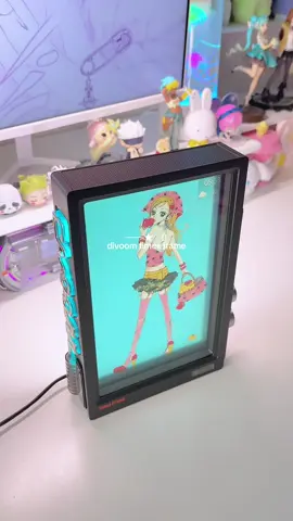 the coolest display frame from @Divoom ⸝⸝.ᐟ⋆ my favorite way to upgrade my shelf or desk click the orange cart button above to get yours 👾🌀  #divoom #divoomtimesframe #digitalframe #digitalpictureframe #gifts #Tech #techtok #desksetup #deskdecor #roomdecor #roominspo #aesthetic #coolgadgets #fyp #fypシ #foryoupage 