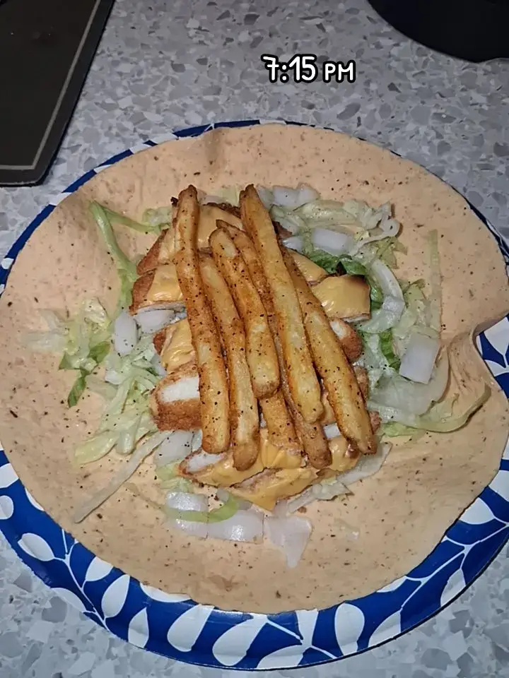 one chicken patty with cheese, onions, lettuce, inside a wrap. ♡♡ super delicious 😋 