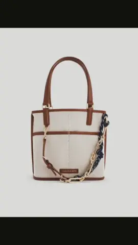 Addison Canvas Knotted-Rope Reversible Tote Bag  Color: Taupe Canvas Mall/App: ₱4,999.00 Mine: ₱1,_50 only ‼️ PRE-ORDER ‼️ Material: Canvas Number of bag strap: 2 Inner compartment: 1 Pouch(es) Handle drop length: 17 cm Outer compartment: 2 Inner Fold(s) Detachable strap: Detachable Adjustable strap: Adjustable Type of closure: None Strap drop length: 32-58 cm Strap length: 66-115 cm Weight: 416 g Width: 21 cm Depth: 10.5 cm Height: 20 cm Note: Items are made in batches, so small imperfections—like uneven edges, loose threads, or light scratches—may be present in longer pieces. These are not valid reasons for a refund. If you're very particular, we suggest not purchasing. Disclaimer: We are not affiliated with the brand. All logos, trademarks, and names mentioned belong to their rightful owners and are used here for reference only. #charlesandkeith #bag #fyp 