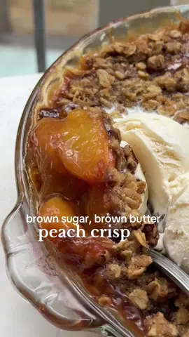 Brown Sugar, Brown Butter Peach Crisp. What peachy dreams are made of. My favorite way to have the beautiful peaches that are popping up right now - simple filling, highlighting them with a brown butter crisp topping  Brown Butter Peach Topping 3/4 cup salted butter 12 tbs, 6oz, browned* 1 cup old fashioned rolled oats 1/2 cup dark brown sugar packed 1/2 cup pecans toasted & chopped 1 1/4 cup all purpose flour spooned & leveled 1/4 tsp kosher salt Brown Sugar Peach Filling 3 lb peaches (about 8-10 average sized peaches) peeled & sliced* 1/2 cup dark brown sugar packed 1 & 1/2 tbs cornstarch 1 tsp vanilla extract 1/4 tsp salt 1 lemon #peaches #peachcrisp #peachrecipe 
