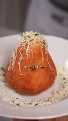 #24 of Italian Forgotten Classics: Arancini Siciliani (Sicilia) In Sicily, they say an arancino holds the entire island inside it. These aren’t just snacks. They’re full meals, full memories, and full of everything that makes Southern cooking unforgettable. Ingredients (Makes about 10–12 arancini): For the rice: • 500 g originario rice (or other short-grain) • 1 L water • 65 g aged provola or caciocavallo, finely grated • 50 g unsalted butter • 2 eggs • 2 g saffron • Salt and pepper to taste For assembling the filling: •500 g ragú • 100 g fresh goat cheese (toma di capra), in small cubes • 65 g aged provola or caciocavallo, grated • 100 g peas • 1 small onion, chopped • Olive oil • Chopped parsley • A pinch of saffron To coat and fry: • 2–3 eggs • Olive oil • Bread crumbs • Frying oil or lard (for deep frying) • Black pepper Instructions: 1. In a wide pot, combine rice, water, saffron, and salt. Bring to a boil and cook until all the water is absorbed, about 14 minutes. 2. While the rice is still warm, mix in butter, grated provola (or caciocavallo), and the eggs. This step must be done before the rice cools. Then let the mixture cool completely 3. In a separate pan, cook peas and onion with olive oil, salt, pepper, and a splash of white wine. Let cool. 4. In a bowl, combine the ragù, peas, cubed goat cheese (toma di capra), grated provola, chopped parsley, and a pinch of saffron. Mix well to create the filling. 5. Take a scoop of cooled rice and flatten it in your hand. Place a spoonful of filling in the center, then close with more rice and shape into a ball. (Some mix the rice and filling together for simplicity, but this is the traditional method.) 6. Beat the eggs with a drizzle of olive oil and a little pepper. Dip each arancino into the egg mixture, then roll in breadcrumbs until well coated. 7. Fry in hot oil or lard at 170°C (340°F) for 6–8 minutes, until golden and crisp on the outside. #arancini #arancinosiciliani #italianforgottenclassics #sicilianstreetfood #raguinside #southernitalykitchen #italiandishesyounevertried 