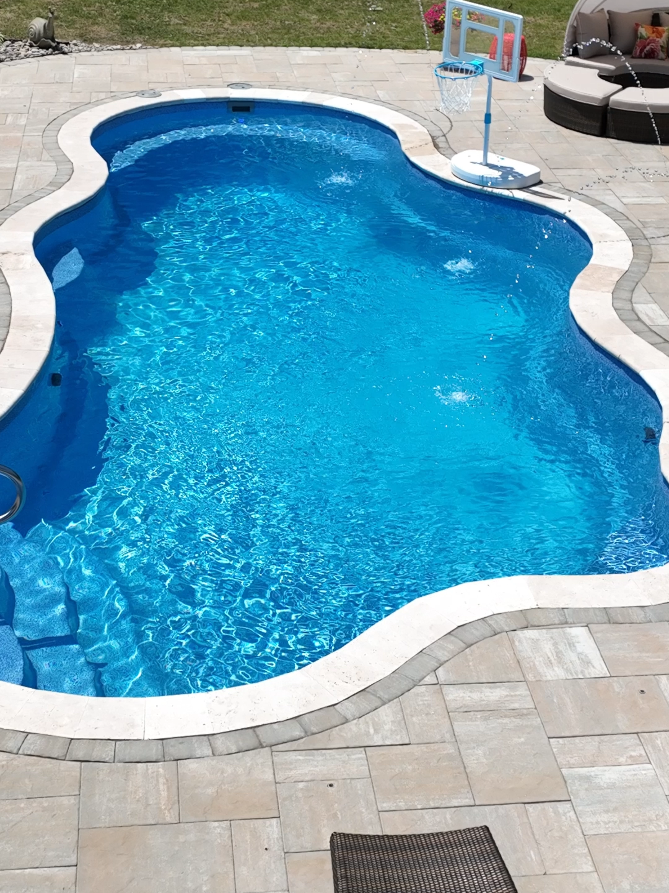 Curves, comfort, and crystal-clear strength 💪💦 This is the Cancun by Latham Pools in Sapphire Blue Crystite — a bold, elegant design that brings both beauty and durability to your backyard. ✔️ Swim-Up Seating – Perfect for kicking back with a cold drink on what many call the “beverage bench.” Built-in seats make this pool the ultimate hangout. ✔️ Slip-Resistant Steps – Safe and smooth entry for swimmers of all ages. ✔️ Crystite Color Technology – A vibrant, premium finish exclusive to Latham, with unmatched shimmer and color depth. ✔️ Reinforced Construction – Latham’s fiberglass laminate structure is 32% stronger thanks to carbon fiber, ribbing, and ceramic-infused resin. 📏 14'–16' wide x 35' long 📐 Depth: 3'6