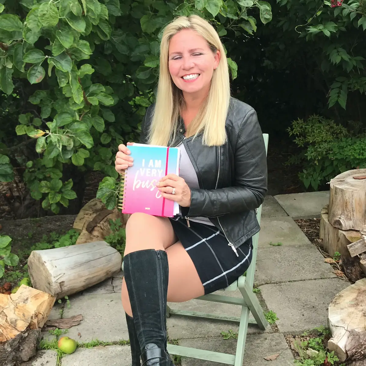 In the garden, where ideas bloom and bold looks rule. Plotting pages for my next book in my fave outfit – Boss leather jacket, power boots, mini skirt, and my favourite brand of trademark tan tights that I’m never without! Confidence is the best accessory. Let’s do this! 💻✨ #BookInProgress #BossVibes #GardenOffice #PowerLook #WriterStyle   
