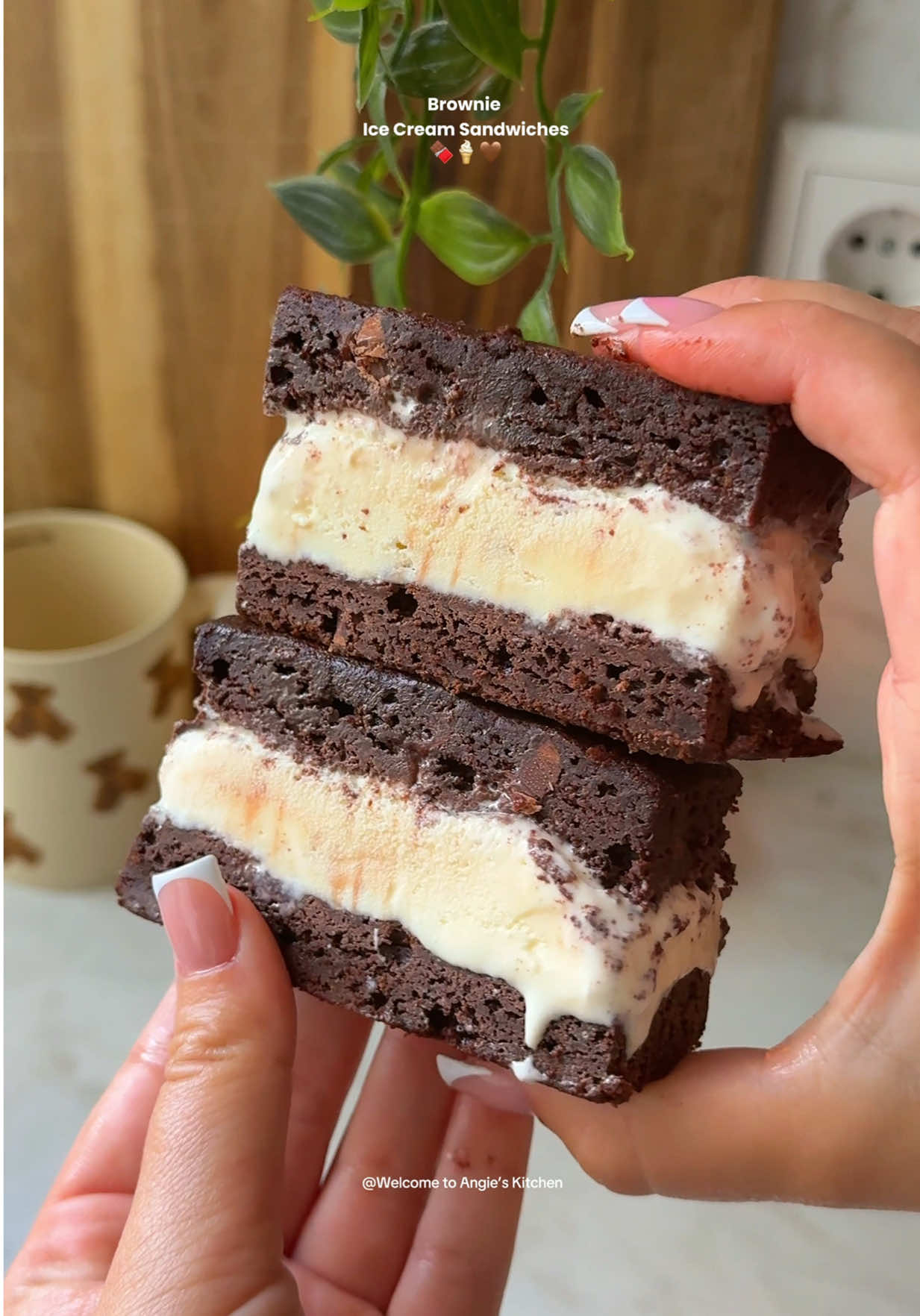 Brownie Ice Cream Sandwiches 🍫🍦 - Ingredients: - 150g dark chocolate (i used 50% cocoa) - 100g unsalted butter - 80g granulated sugar - 80g light brown sugar - 2 large eggs - 1 teaspoon vanilla extract  - 60g all-purpose flour - 25g cocoa powder - A pinch of salt - 50g milk chocolate chips - 50g semi sweet or dark chocolate chips Extras: - 1 kg Vanilla ice cream Instructions: 1. Preheat your oven to 170•C (fan setting), line two 20cm baking tins with parchment papaer. Set aside. 2. Melt the chocolate and the butter together (you can do this in a saucepan or over a double boiler). Let it slightly cool. 3. In a large bowl beat together the eggs, the brown sugar and the granulated sugar until fluffy and pale in color. I recommend using a hand mixer. 4. Pour in the chocolate-butter mixture along with the vanilla and mix until incorporated. 5. Sift in the cocoa powder, flour and salt. Mix gently with a spatula until combined. Do not overmix. 6. Lastly fold in the chocolate chips. 7. Divide the batter equally between the two baking tins and bake in the preheated oven for 15 minutes. 8. Once ready, take them out the oven and let them cool. 9. Once cool, gently place one of the brownies back into the (deep) baking tin.  10. Scoop the ice cream on top and spread it out evenly. (Make sure the ice cream is scoopable and not rock hard) 11. Lastly, gently place the second brownie on top. 12. Cover tightly with plastic wrap and place it in the freezer for minimum 3 hours to overnight. 13. Before cutting, take it out the freezer and let it sit at room temperature for 15 minutes. You can also warm the knife up under hot water. 14. After cutting, cover each one individually in plastic wrap and place in the freezer for up to one month. 15. Before each serving, I recommend letting it sit at room temperature for about 15 minutes.  #brownies #brownie #brownierecipe #icecream #icecreamcake #icecreamsandwich #asmr #asmrfood #asmrsounds #baking #baker #bakersoftiktok #foodblogger #EasyRecipe 