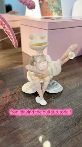 frog holding a guitar! #fyp#shells#shellcrafts#inspo#florida#Summer#jewerly#crafts#tutorial#summercrafts