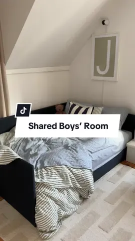Stripes on stripes on stripes #sharedroom #boysroom #boysroomdecor #boysroominspo #toddlerroom #kidsroom #daybed #hmhome #boysbedroom #roommakeover #cozy 