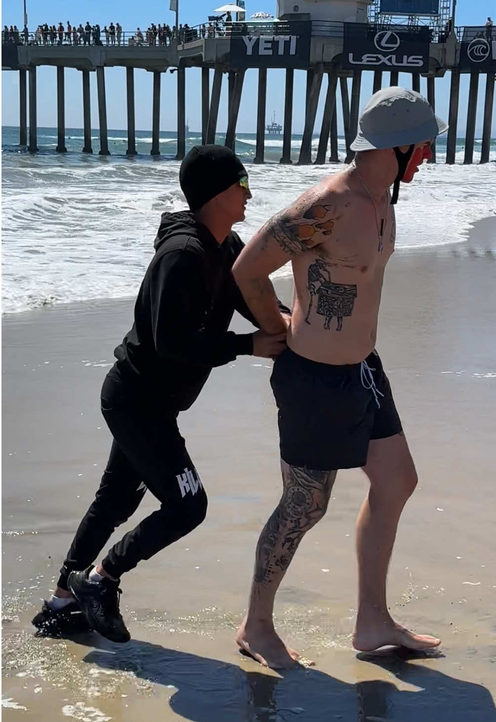 Core Lord Regulates Beginner Surfer at the U.S. Open of Surfing.