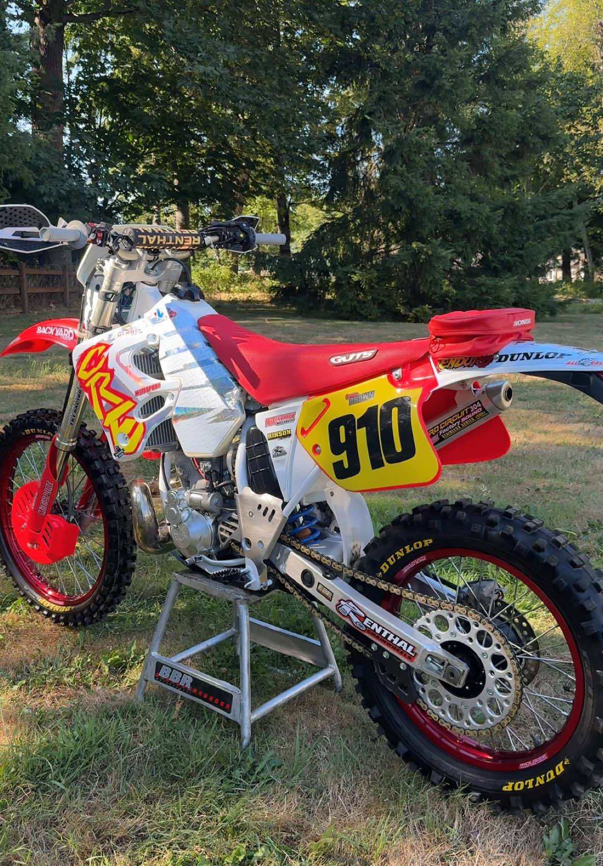 Tennessee Knock Out is coming up. Am I any better at Hard Enduro than last year? Probably not 😂😭 But I’m going to have the most fun out of everyone for sure. This @MotoSport.com CRE250 is the machine of choice that I’m going to be tumbling down some hills on. Huge thanks to everyone who helped us get this thing dialed in, it started out ROUGH! MotoSport with all the OEM goods. @All Balls Racing with the bearings and seals. TBT Racing suspension. Panthera Motorsports electric start kit (I can use all the help I can get on Hard Enduro) 😂😭 @Lectron Fuel Systems Billetron. @backyarddesign retro graphics. Renthal chain/sprokets bars/grips. @Guts Racing seat cover. Dunlop EN91EX’s. Works Connection clutch lever and guards. SXS slide plate. Hinson clutch. Pro Circuit pipe and silencer, yes the moto one because I’m gonna bark this thing while stuck in the rocks 😂 And a tool bag for parts when I break everything off of it. Devol Racing holeshot device incase they decide to have a gate 😜 Bolt Motorcycle Hardware olts. @Maxima Racing Oils and fluids. Thank you Tyler Bair for helping screw this machine together. @Red Bull Motorsports @Red Bull #CRE250 #CR250 #honda #2stroke 