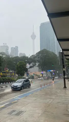 Rainy days in KL hit different 🌧️ Still beautiful, even through the storm. #UrbanWonders  #KualaLumpurRain #KLVibes #MenaraKL #RainyCity
