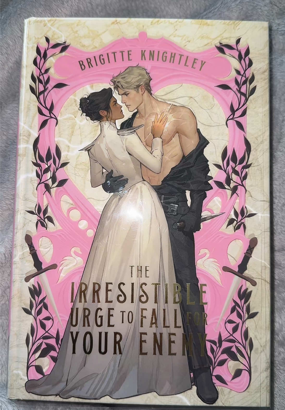 i can’t stop staring at it 😭 i LOVED this book and love this edition even more @Illumicrate ✨ #brigitteknightley #illumicrate #specialedition #BookTok #bookrec #theirresistibleurgetofallforyourenemy 